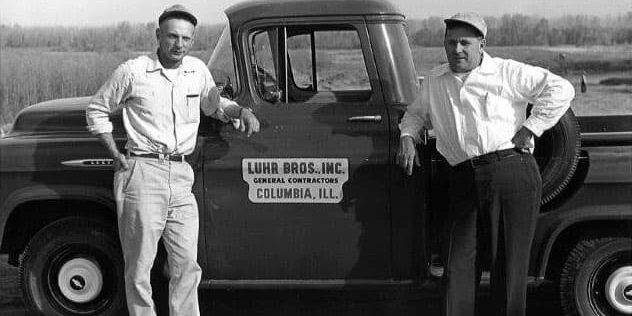 Alois and Eugene Luhr in 1947 with truck that says Luhr Brothers on the side
